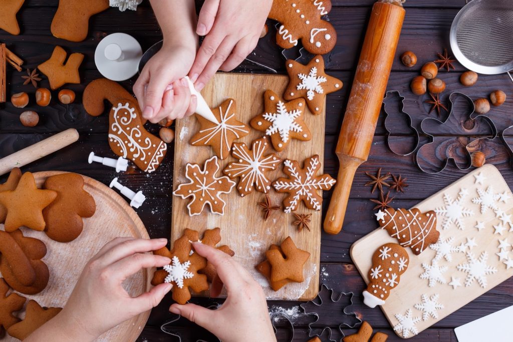 Hands making Christmas cookies