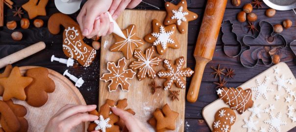 Hands making Christmas cookies